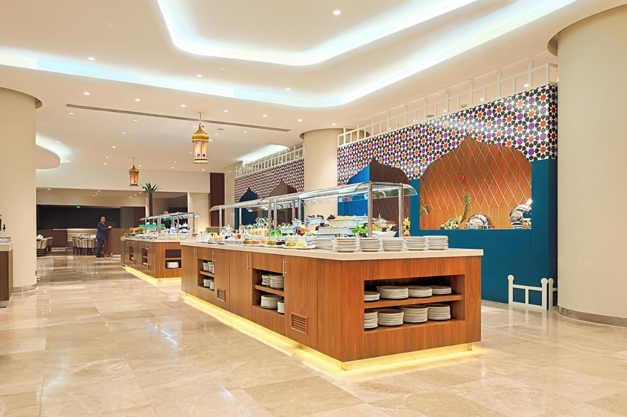 Holiday Suites Al Aziziah Mekka Kültér fotó The hotel's restaurant